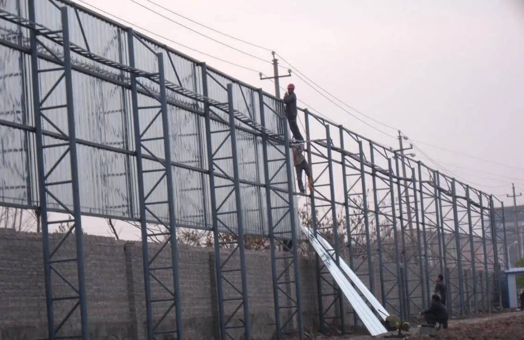 Outdoor billboards and hoardings dominate highways, city junctions, and commercial zones.